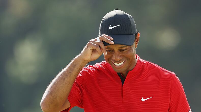 Tiger Woods of the United States reacts after finishing on the 18th green during the final round of the Masters at Augusta National Golf Club on Nov. 15, 2020, in Augusta, Georgia. (Patrick Smith/Getty Images/TNS)