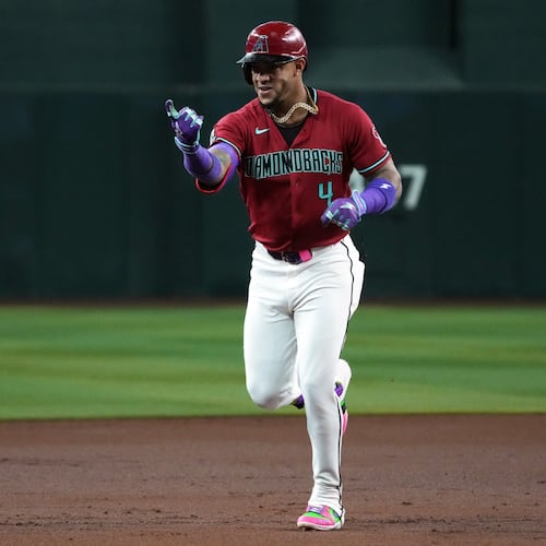 Arizona Diamondbacks' Ketel Marte reacts after hitting a solo home run against the Colorado Rockies in the first inning of a baseball game, Tuesday, Aug. 11, 2026, in Phoenix. (AP Photo/Rick Scuteri)