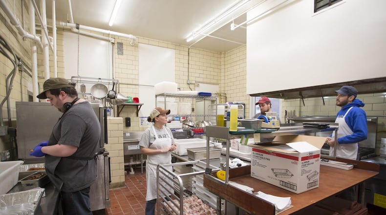 The school’s nutrition team works out of the kitchen at the middle school building in Ormewood Park. Meals are prepped there, then either served in the middle school cafeteria or delivered to the elementary school campus in Grant Park. Photo: Kelley Klein
