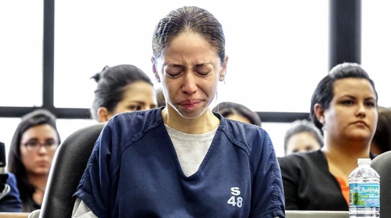 Florida defendant Dalia Dippolito listens to her attorney read a letter from her mother during her sentencing hearing on Friday. Dippolito was convicted again of plotting to kill her husband.