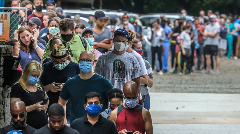 Voters had a long wait, up to three hours, at the Park Tavern polling place in Atlanta on June 9, 2020. (John Spink/Atlanta Journal-Constitution/TNS)