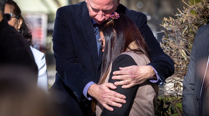 FILE - Joel Paez and Belkis Teran, parents of Manuel Paez Terán, known as “Tortuguita,” embrace at a news conference in Decatur, Ga., on Monday, Feb. 6, 2023. (Arvin Temkar/Atlanta Journal-Constitution via AP, File)