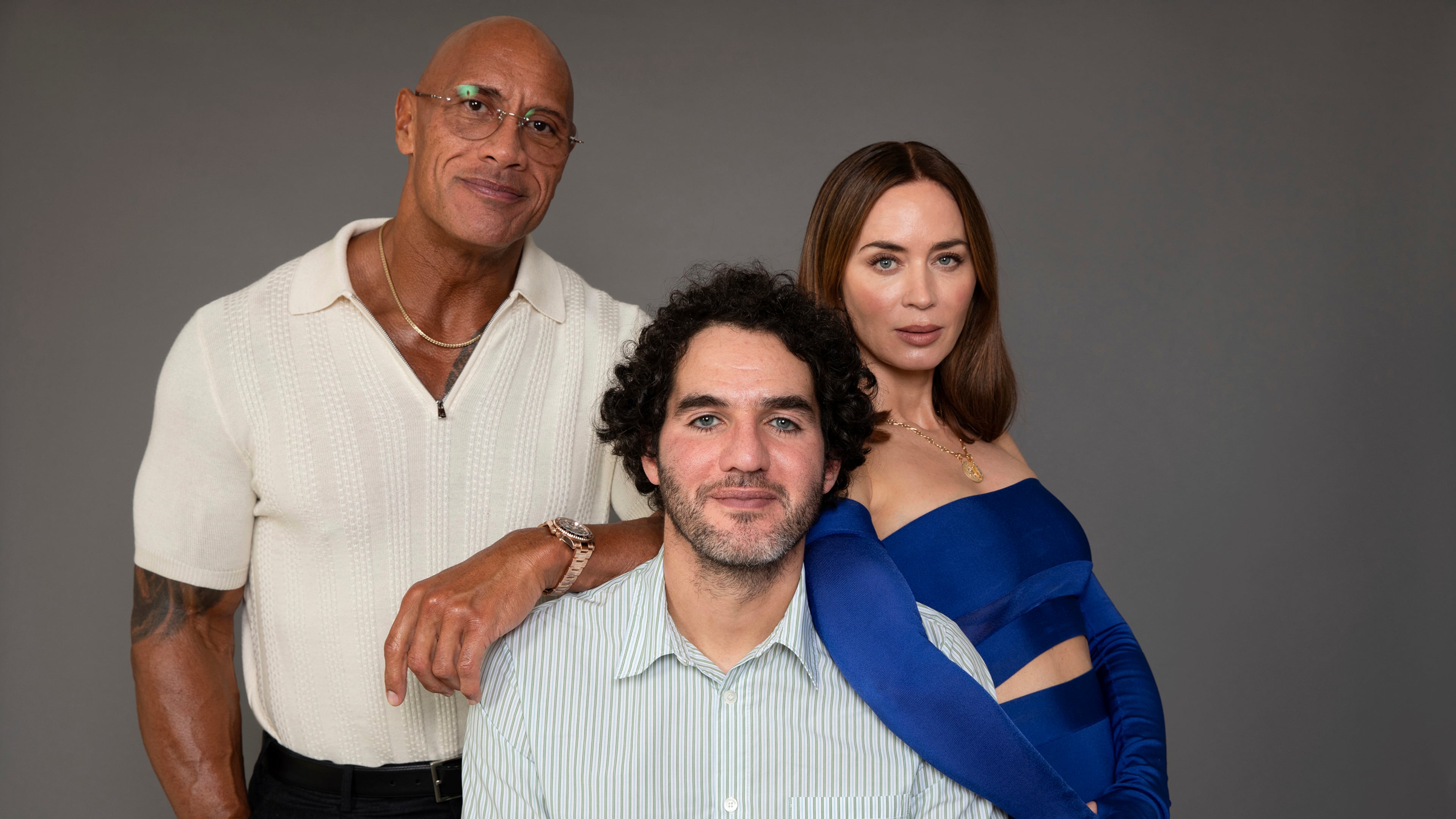 Dwayne Johnson, from left, Benny Safdie and Emily Blunt pose to promote their film "The Smashing Machine" on Friday, Sept. 12, 2025, in Los Angeles. (Photo by Rebecca Cabage/Invision/AP)
