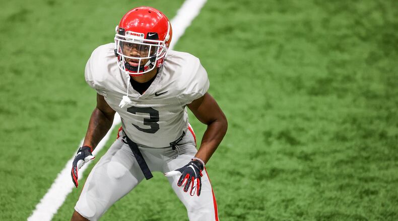 Georgia defensive back Tyson Campbell (3) follows the commands of coach Charlton Warren during one of the Bulldogs’ preseason practices in Athens, Ga., on Wed., Aug. 26, 2020. (Chamberlain Smith/UGA)