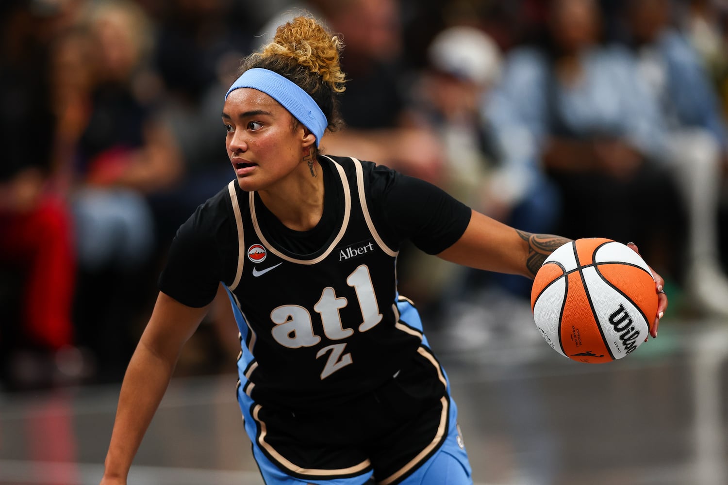 Atlanta Dream guard Te-Hina Paopao (2) dribbles during the second half of a WNBA game against the Las Vegas Aces at State Farm Arena on Sunday, May 17, 2026, in Atlanta. (Colin Hubbard for the AJC) 
