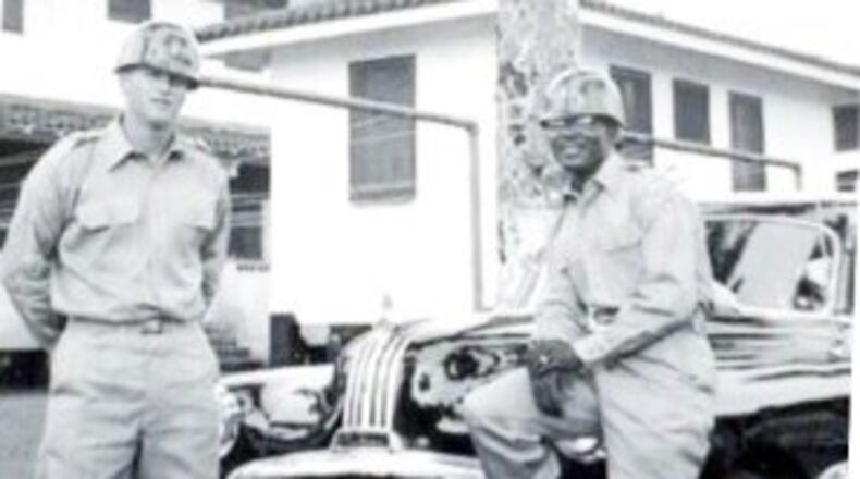 A provided photo shows the father of C. David Moody (right) serving in the military.