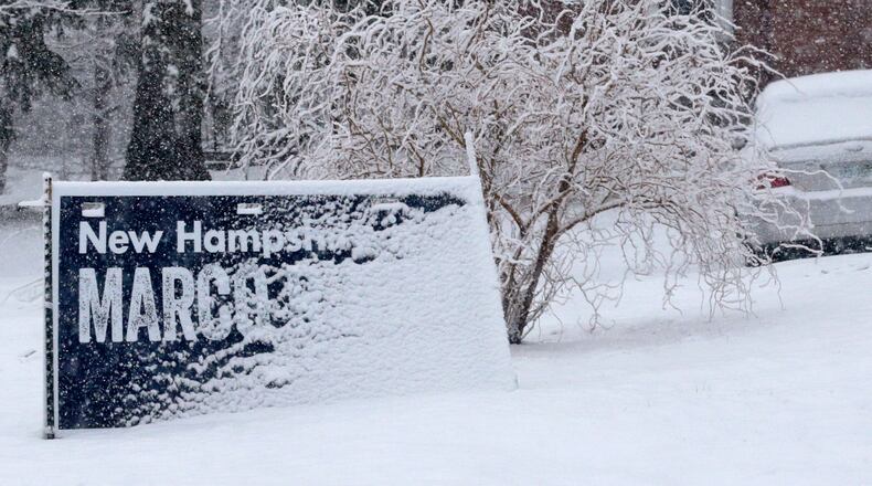 A campaign sign for Republican presidential candidate, Sen. Marco Rubio, R-Fla. is obstructed with covered in freshly fallen snow in East Derry, N.H., on Friday. AP/Charles Krupa