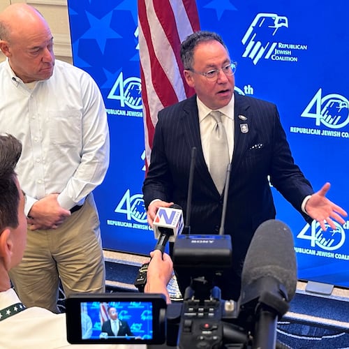 Republican Jewish Coalition CEO Matt Brooks, center, alongside Ari Fleischer, an RJC board member and press secretary to former President George W. Bush, answers questions from members of the news media about confronting antisemitism within the Republican Party, during the coalition's annual conference at the Venetian Resort in Las Vegas, Saturday, Nov. 1, 2025. (AP/Thomas Beaumont)
