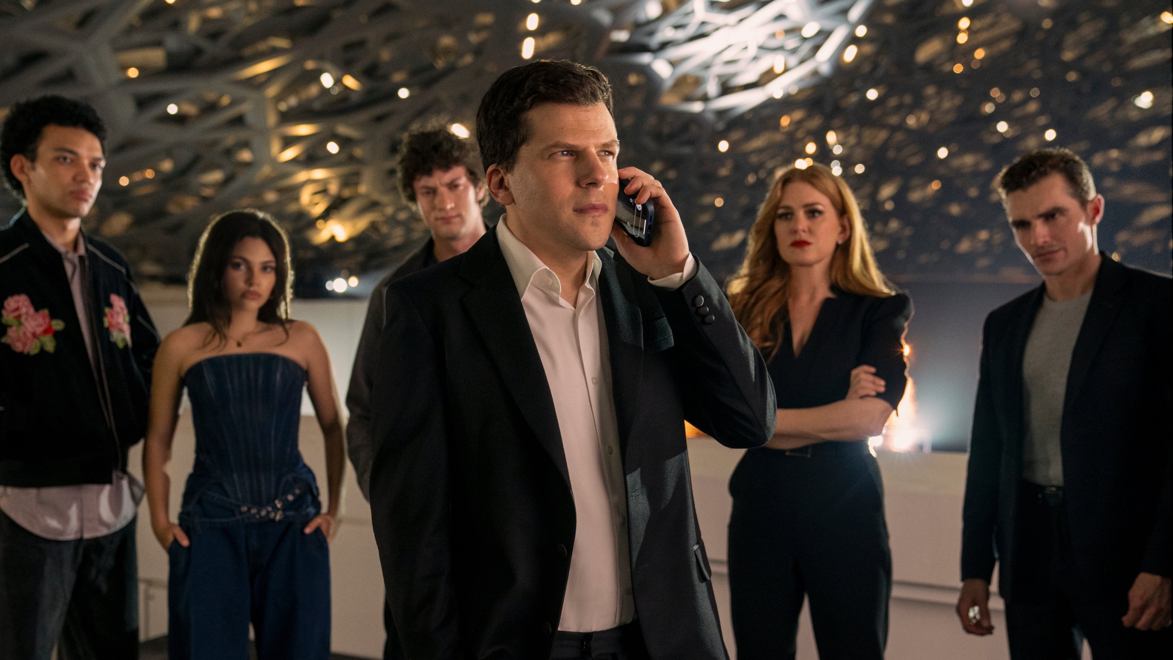 This image released by Lionsgate shows, from left, Justice Smith, Ariana Greenblatt, Dominic Sessa, Jesse Eisenberg, Isla Fisher and Dave Franco in a scene from "Now You See Me: Now You Don't." (Katalin Vermes/Lionsgate via AP)