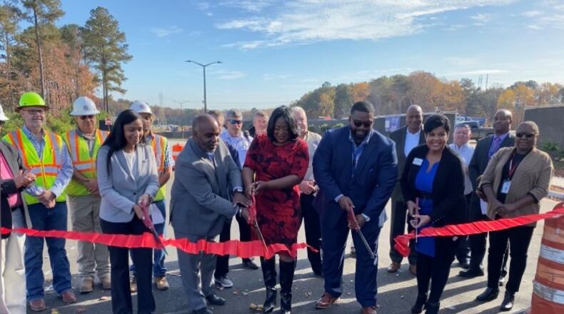 Leaders from Forest Park and Kroger cut the ribbon on new Rateree Road at the Gillem Logistics Center.