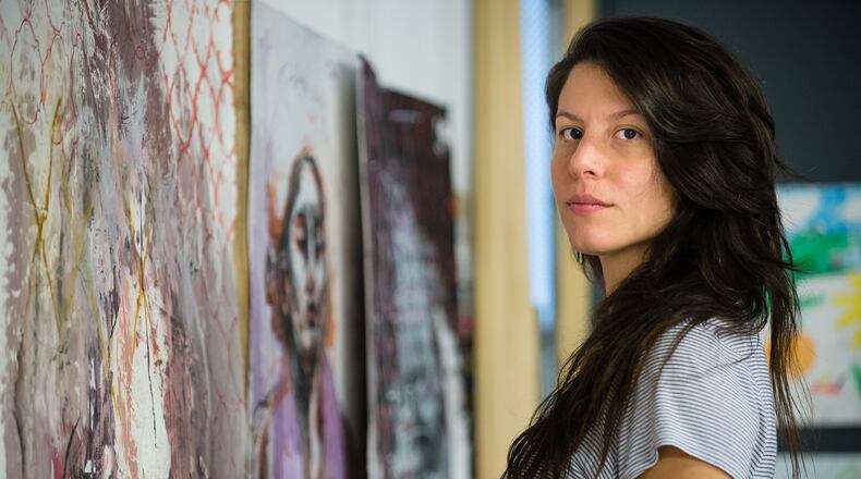 Jessica Caldas poses for a portrait in her studio at Georgia State University Wednesday. Jessica posted #MeToo but had mixed feelings about it. BITA HONARVAR/SPECIAL