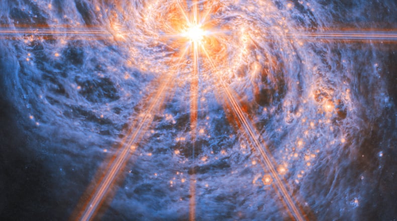 This image provided by NASA/ESA/Webb from the NASA/ESA/CSA James Webb Space Telescope shows Messier 77 (M77), a barred spiral galaxy famous and appreciated among astronomers for its combination of relative proximity and spectacular features to study. (NASA via AP)