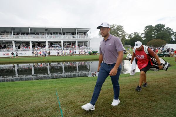 Xander Schauffele walks to the fifteenth green during the first round of the Tour Championship at East Lake Golf Club, Thursday, August 25, 2022, in Atlanta. (Jason Getz / Jason.Getz@ajc.com)