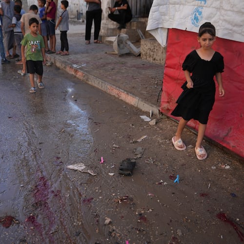 Palestinians inspect the site of an Israeli airstrike in Nuseirat, central Gaza Strip, Friday, July 17, 2026. (AP Photo/Abdel Kareem Hana)