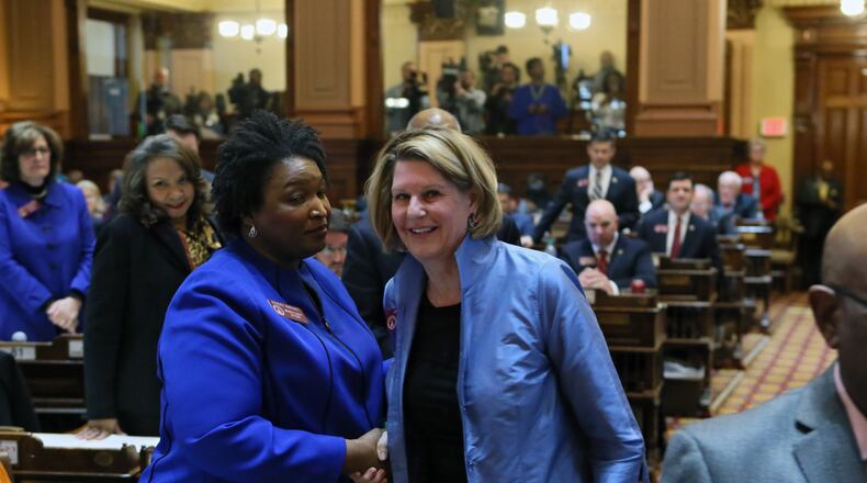 House Minority Leader Stacey Abrams, D-Atlanta, congratulates state Rep. Jan Jones, R-Milton, after Jones was re-elected as speaker pro tem on Monday, as lawmakers returned to Atlanta for a new 40-day session. Bob Andres, bandres@ajc.com