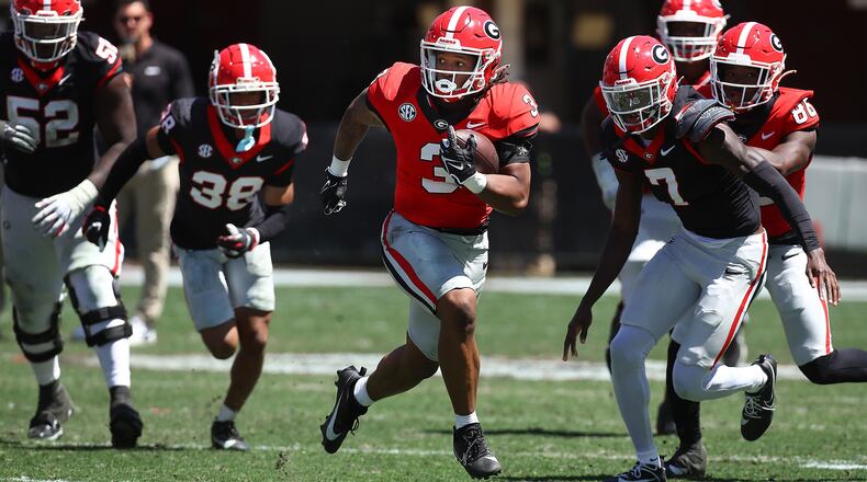 Georgia running back Andrew Paul breaks away for yardage during the G-Day game on Saturday, April 13, 2024. (Curtis Compton for the Atlanta Journal Constitution)