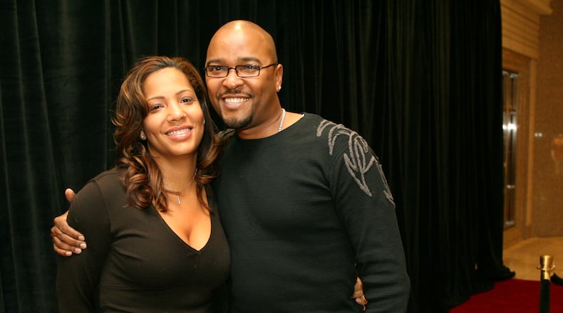 070107 - ATLANTA, GA -- V-103's Ryan Cameron and wife Kysha pose on the red carpet to the 49th Annual Grammy Awards VIP reception and ceremony at Tiffany & Co. at Phipps Plaza on Tuesday, Jan. 9, 2007. The event marks a record number of GRAMMY nominations from the state, with artists, writers, producers and engineers earning 52 nominations for music's most celebrated honor. Some this year's nominees include Akon, T.I., Third Day, Field Mob and members of Sugarland and Mastodon. (KEITH HADLEY / AJC staff)