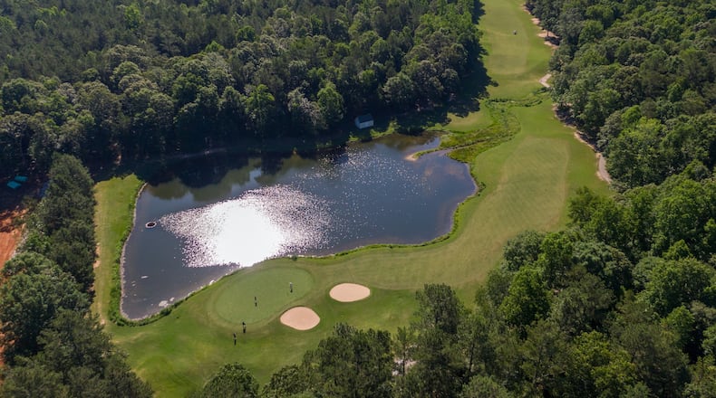 Aerial view of the 8th green (foreground) and fairway at Chateau Elan Golf Club in Braselton. (Hyosub Shin / Hyosub.Shin@ajc.com)