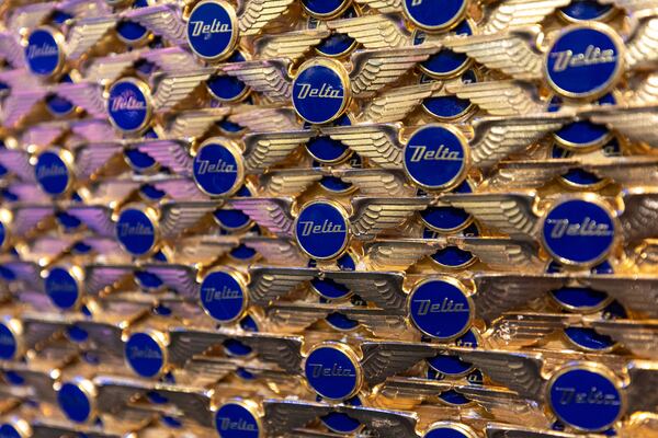 A display of pilot wing pins is seen at the Delta Flight Museum in Hapeville on Wednesday, June 11, 2025, a pilot graduation ceremony day. (Arvin Temkar/AJC)