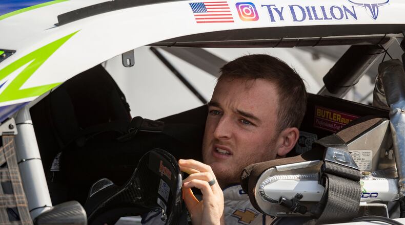 Driver Ty Dillon, here awaiting the start of a race last year, has had plenty to say in this time of unrest. (AP Photo/Brien Aho)