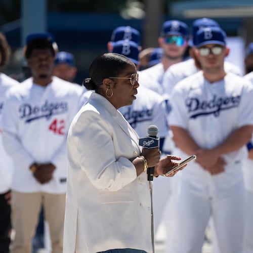 Jackie Robinson's granddaughter, Sonya Pankey Robinson, speaks as members of the Los Angeles Dodgers and the New York Mets gather for a ceremony before a baseball game Wednesday, April 15, 2026, in Los Angeles. (AP Photo/Jae C. Hong)