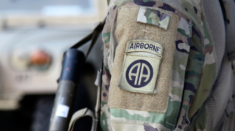 FILE - An 82nd Airborne Division paratrooper participates in artillery training during a field exercise at Fort Bragg, N.C., on Aug. 26, 2020. (AP Photo/Sarah Blake Morgan, File)