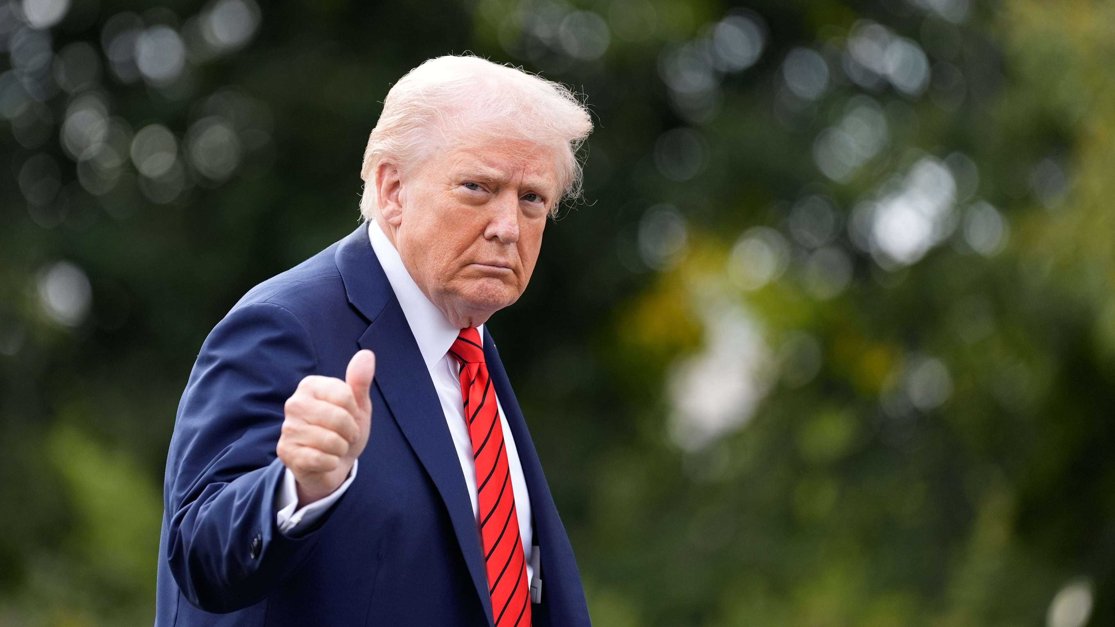 President Donald Trump walks on the South Lawn after arriving on Marine One at the White House, Friday, Oct. 10, 2025, in Washington. (AP Photo/Alex Brandon)
