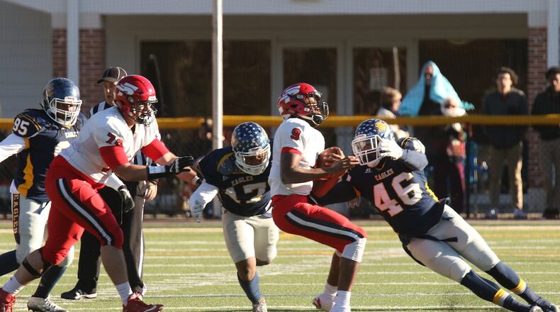 Reinhardt’s Javier Dyer (46) has 10 sacks and 21.5 tackles for loss and fellow defensive end Tevin McCoy (17) has a team-leading 11.5 sacks heading into an NAIA semfinal against the University of Saint Francis (Ind.).Photo credit: G-RoxPhotos.com