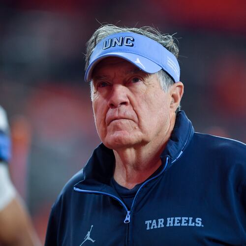 FILE - North Carolina head coach Bill Belichick walks on the field before an NCAA college football game against Syracuse, Oct. 31, 2025, in Syracuse, N.Y. (AP Photo/Adrian Kraus, File)