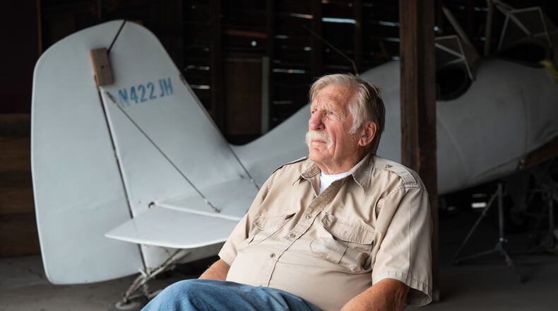 In this Aug. 2025 photo provided by James Wilson, Ken Jouppi sits in a hanger at the Shoshone County Airport in Shoshone County, Idaho. (James Wilson via AP)