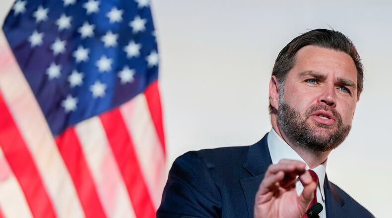 Vice President JD Vance speaks with Breitbart News Washington bureau chief Matthew Boyle at Andrew W. Mellon Auditorium, Thursday, Nov. 20, 2025, in Washington. (AP Photo/Julia Demaree Nikhinson)