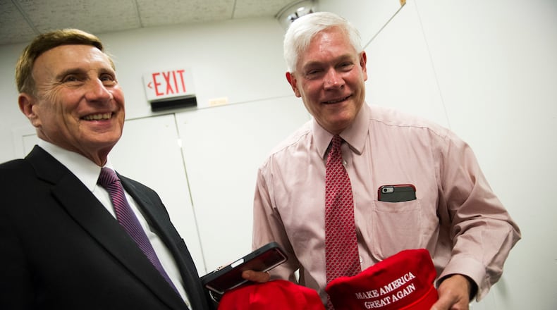 Rep. John Mica, R-Fla., left, and Rep. Pete Sessions, R-Texas, display their "Make America Great Again" hats after attending a House Republican leadership meeting on Capitol Hill in Washington, Tuesday, Nov. 15, 2016. (AP Photo/Cliff Owen)