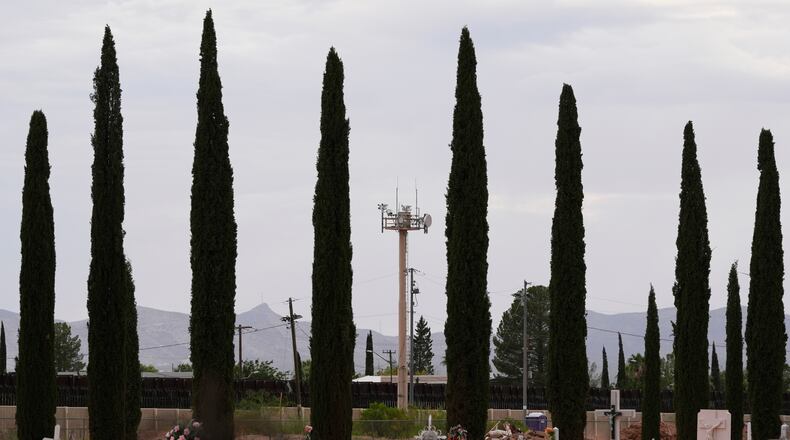 FILE - Surveillance technology used by various law enforcement sit on a tower at the border wall, July 28, 2025, in Douglas, Ariz. (AP Photo/Ross D. Franklin, File)