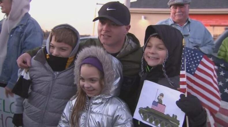 Dozens of people in Winthrop, Massachusetts, lined the streets to surprise a soldier returning home from serving in Afghanistan.