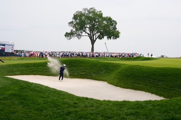 Viktor Hovland, of Norway, hits from a bunker on the second hole during the second round of the U.S. Open golf tournament at Oakmont Country Club Friday, June 13, 2025, in Oakmont, Pa. (AP Photo/Charlie Riedel)