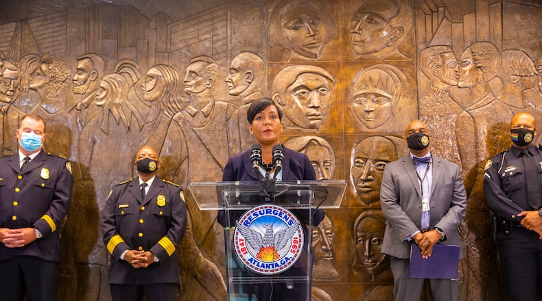 Atlanta Mayor Keisha Lance Bottoms leads a press conference Tuesday, Aug 3, 2021 at City Hall to address a rise in crime, the recent murder in Piedmont Park and covid delta concerns. She is supported by Deputy Chief Charles Hampton, Atlanta Police Chief Rodney Bryant and Emory infectious diseases Dr. Carlos Del Rio to address while addressing city's current issues. (Jenni Girtman for The Atlanta Journal-Constitution)