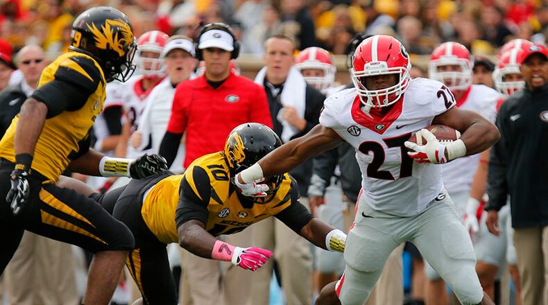 Georgia's Nick Chubb (27) had 31 rushing attempts entering the Missouri game and then added 38 more.