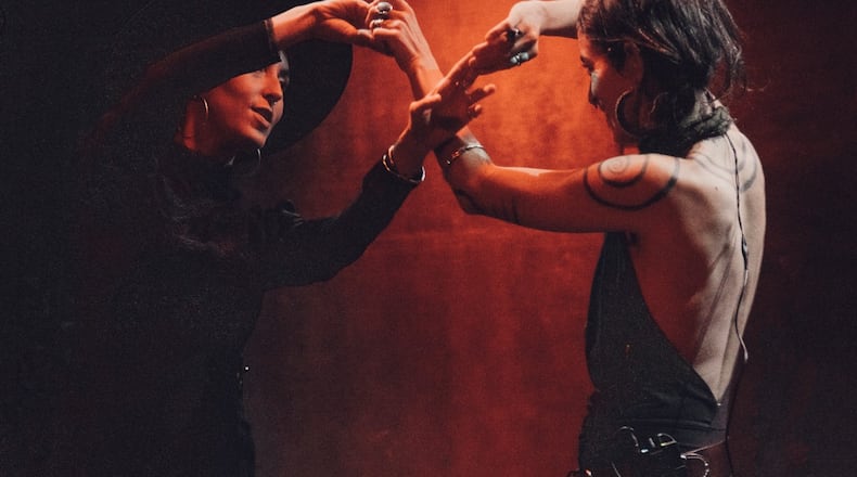 Sisters Chloe (left) and Leah Smith are the core of Rising Appalachia, a world music group formed in the girls' hometown of Atlanta in the mid-2000s.