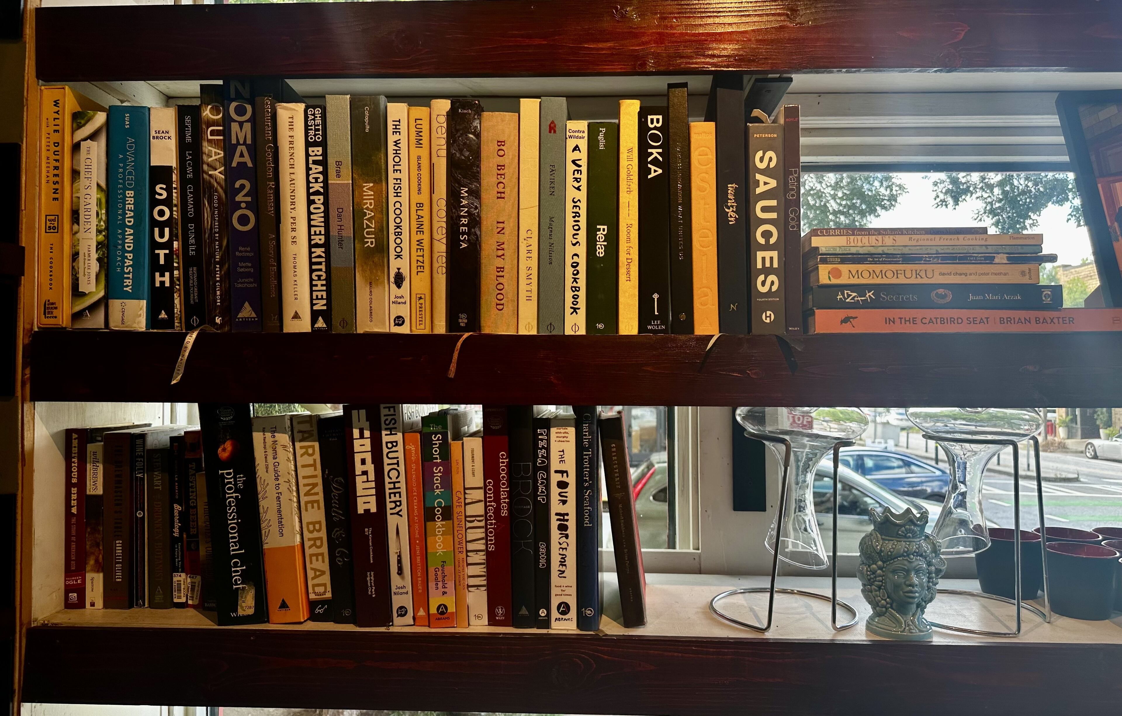 Chef Cody Chassar keeps his collection of cookbooks at Gunshow for his staff to share. (Courtesy of Cody Chassar)