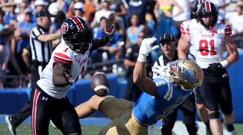 Utah cornerback Clark Phillips III, left, breaks up a pass intended for UCLA wide receiver Jake Bobo in the third quarter at the Rose Bowl on Saturday, Oct. 8, 2022, in Pasadena, California. (Luis Sinco/Los Angeles Times/TNS)