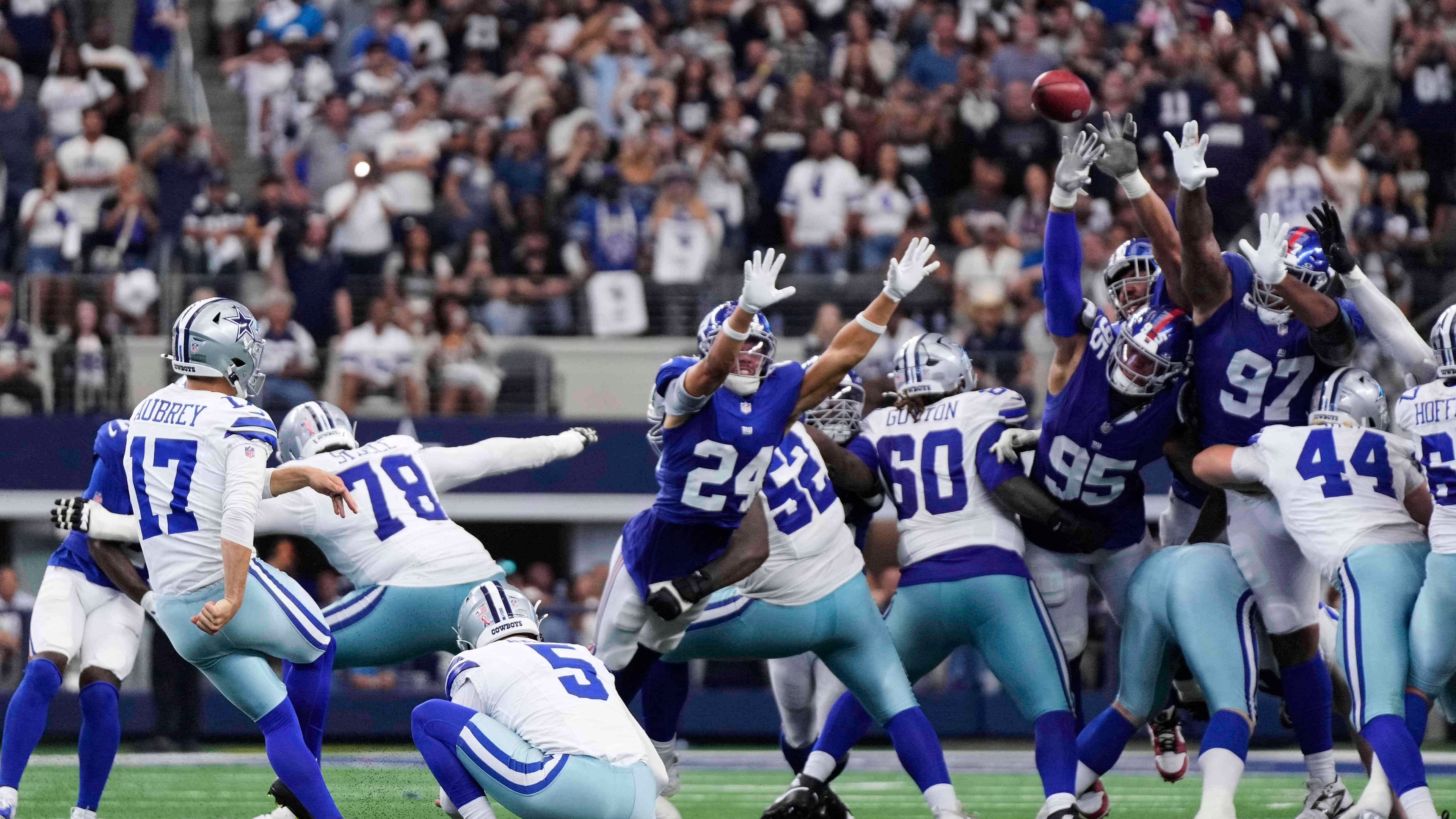 Dallas Cowboys place kicker Brandon Aubrey (17) kicks a game-winning field goal in overtime of an NFL football game against the New York Giants Sunday, Sept. 14, 2025, in Arlington, Texas. (AP Photo/Jeffrey McWhorter)