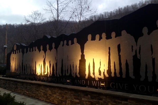 FILE - The Upper Big Branch Miners Memorial is illuminated in Whitesville, W.Va. Dec. 3, 2015. The memorial honors 29 miners killed in a 2010 explosion at the nearby Upper Big Branch mine. (AP Photo/John Raby, File)