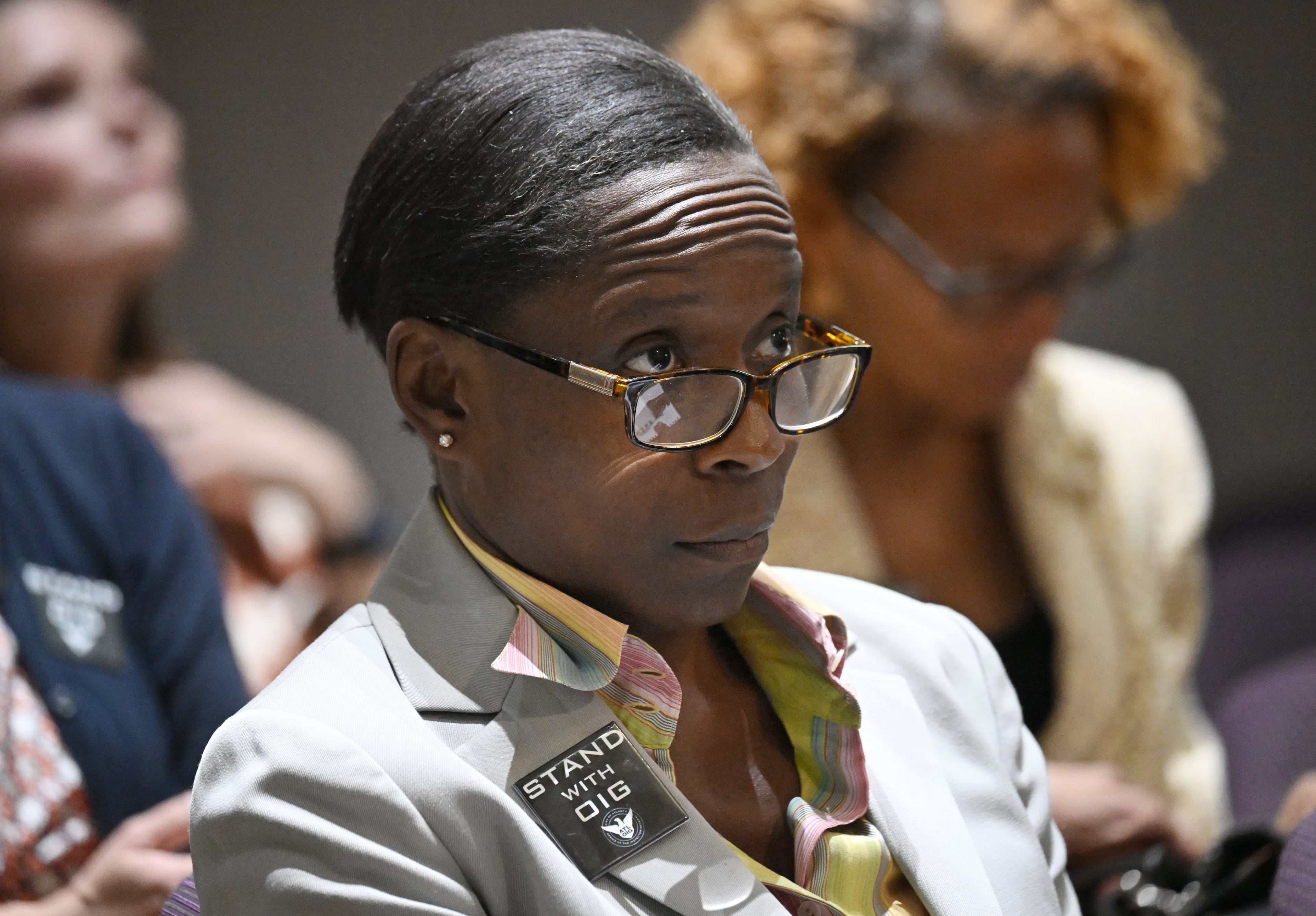 Then-Inspector General Shannon Manigault sits among other attendees during the first meeting of a task force established to review the inspector general's authority at Atlanta City Hall. (Hyosub Shin/AJC 2024)