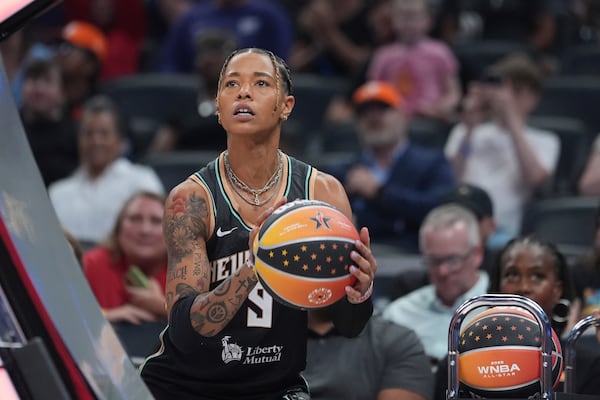 New York Liberty's Natasha Cloud shoots during the skills challenge at the WNBA All-Star basketball weekend, Friday, July 18, 2025, in Indianapolis. (AP Photo/Michael Conroy)