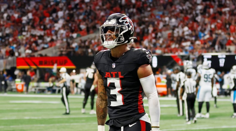 Atlanta Falcons safety Jessie Bates III  reacts after intercepting the ball in the first half against the Carolina Panthers on Sunday, Sept. 10, 2023, at Mercedes-Benz Stadium in Atlanta. (Miguel Martinez/The Atlanta Journal-Constitution)