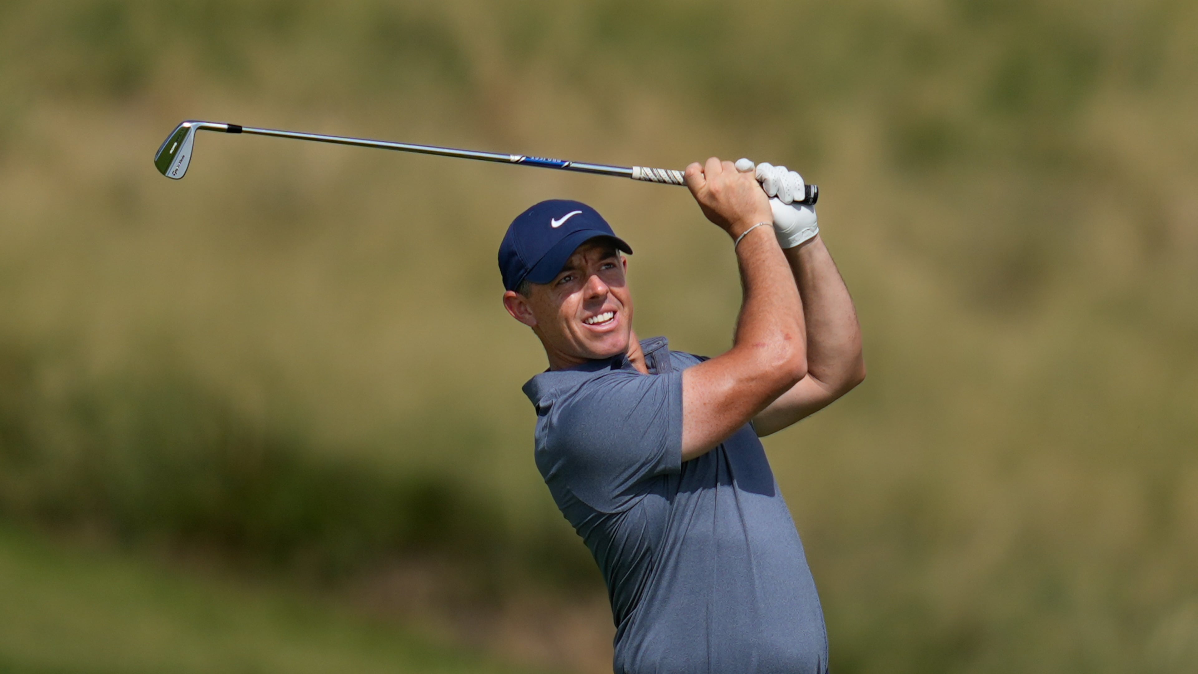 Rory McIlroy of Northern Ireland watches after playing second shot on the 7th hole during the final round of Abu Dhabi Golf Championship in Abu Dhabi, United Arab Emirates, Sunday, Nov. 9, 2025. (AP Photo/Altaf Qadri)