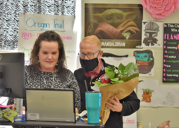 Cherokee County Superintendent of School Dr. Brian V. Hightower surprises Boston Elementary School Digital Learning teacher Brenna Lloyd and her Digital Learners on her computer screen with the news she is a CCSD Teacher of the Year Finalist.