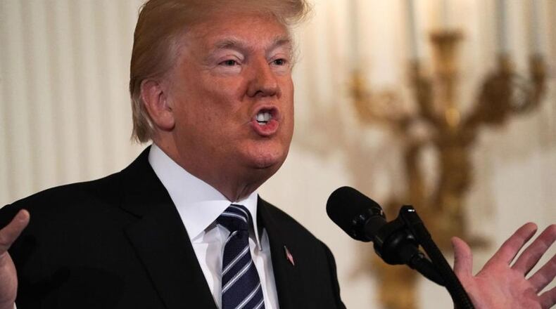 In a tweet Sunday, President Donald Trump wants the Justice Department to investigate whether the DOJ or FBI spied on his presidential campaign in 2016.