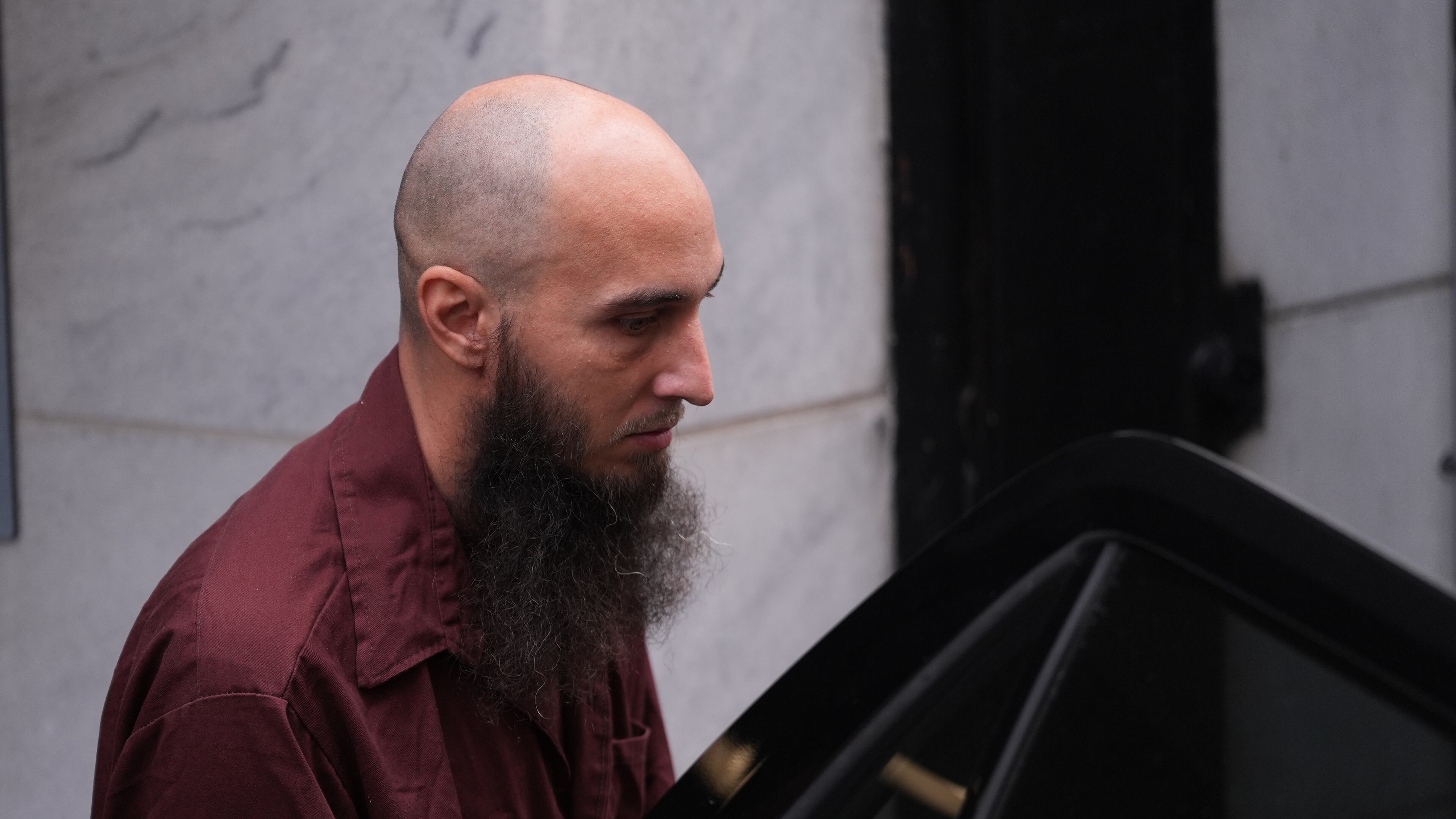 Cody Balmer, accused of setting a fire at Pennsylvania Gov. Josh Shapiro's official residence, leaves Dauphin County Courthouse on Tuesday, Oct. 14, 2025 in Harrisburg, Pa. (AP Photo/Matt Slocum)