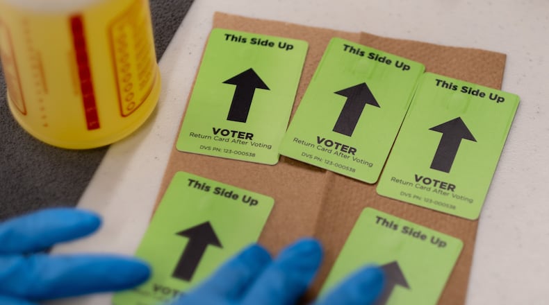 Voters in an Austell voting precinct may have to cast their ballots in a Police Academy training center beginning next year. Local civil rights attorneys say that could turn Black voters away from the polls. (AJC file)